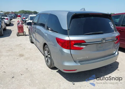 2022 Honda Odyssey Touring z USA, uszkodzony, nr VIN 5FNRL6H8XNB025847